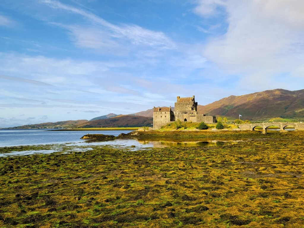 Eilean Donan Castle stands majestically by Loch Duich in Scotland, capturing historical elegance.